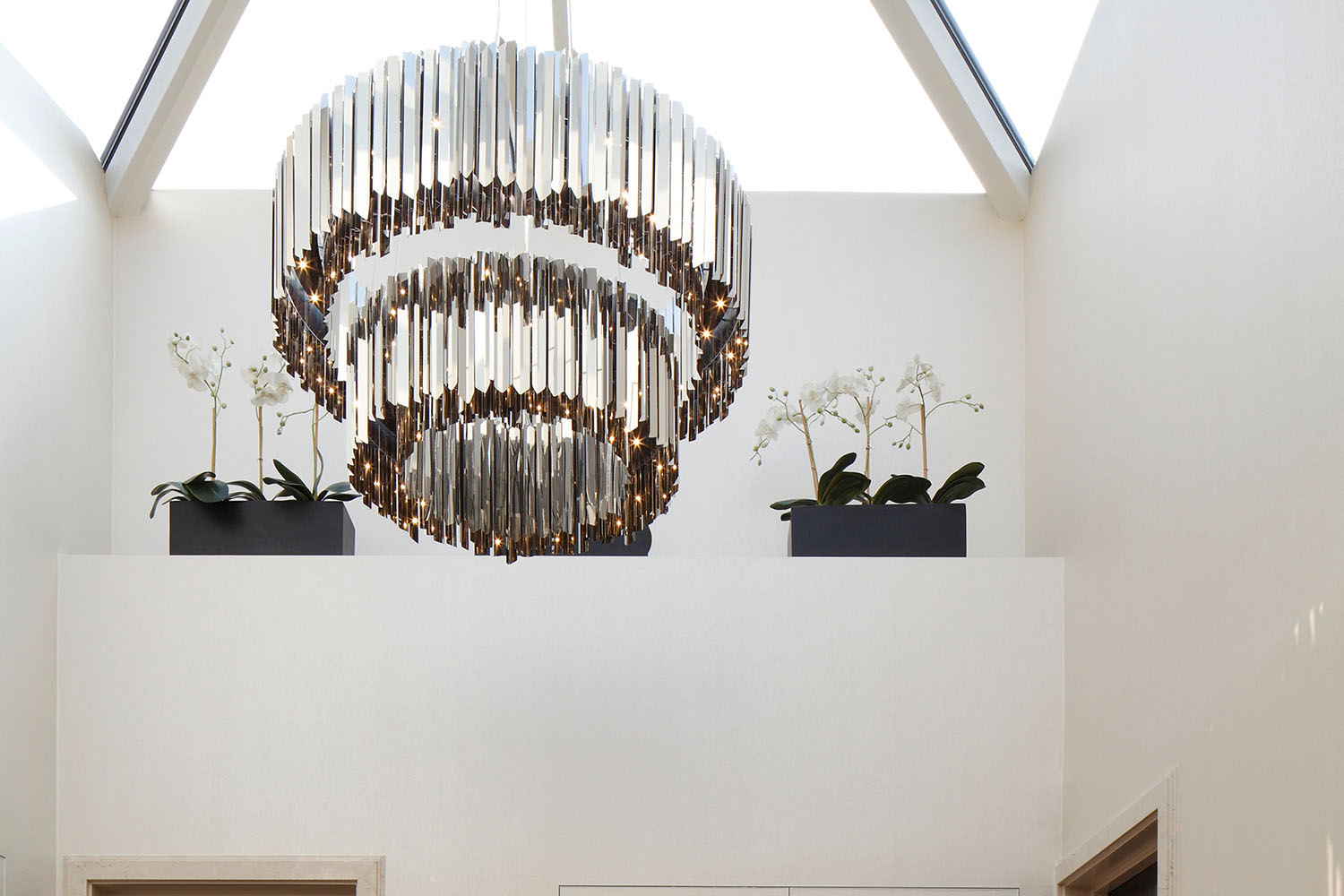 Tiered Facet Chandelier → Tom Kirk Lighting